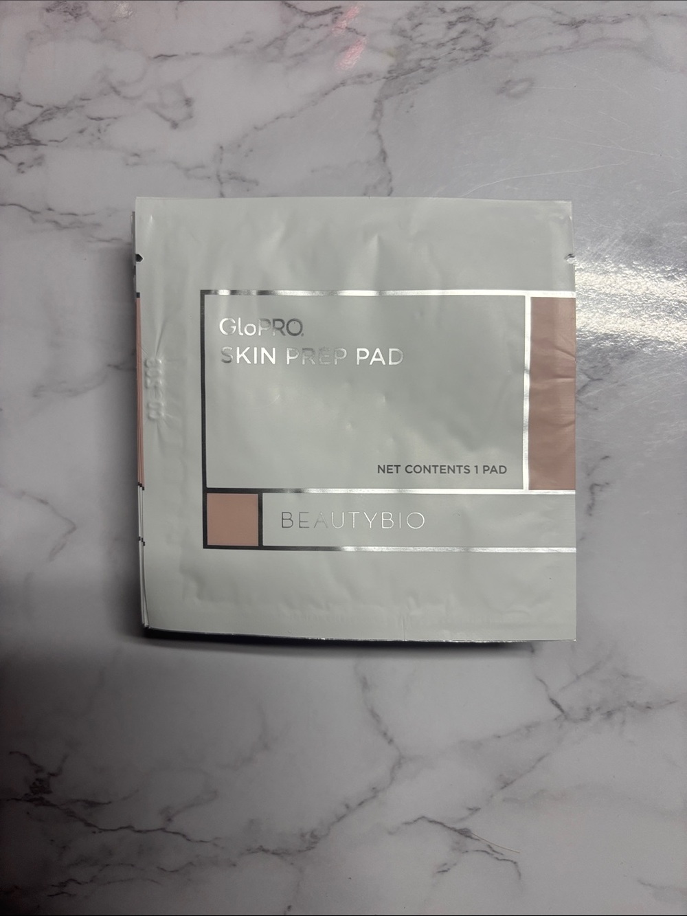 GloPRO Skin Prep Pad by — White with Blush Accents